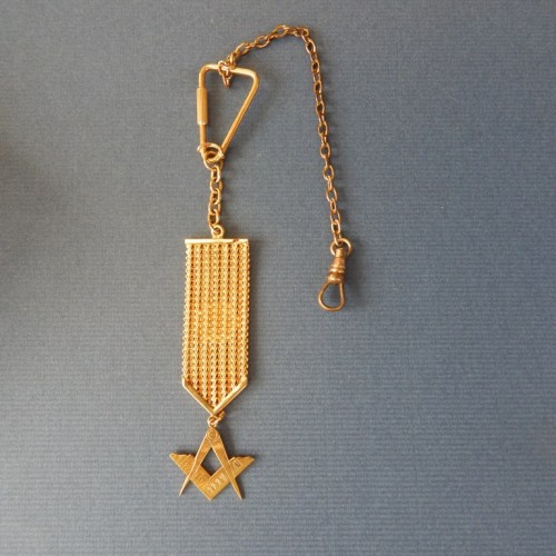 Golden Chatelaine with compass and square