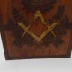 wooden hand extended panel with compass and square. with gold paint