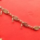 antique gold watch chain with maconic symbols with large ball charm.