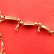 antique gold watch chain with maconic symbols with large ball charm.